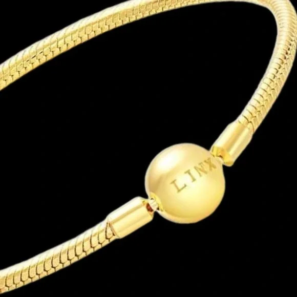 Linx Yellow Gold Bracelet with Gold Silver and Pink Nurse Girlfriend Charms